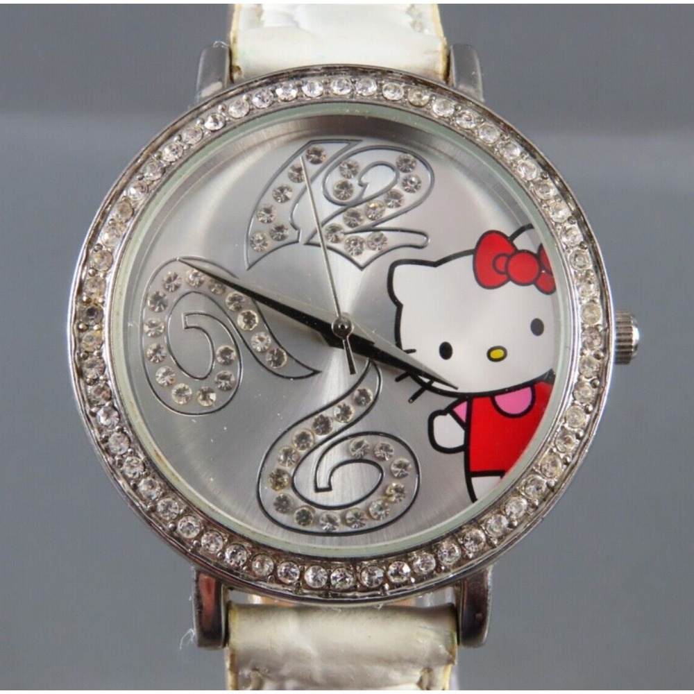 HELLO KITTY Sanrio Wrist Watch CRYSTAL BEZEL & NUMBERS White Leather Band SILVER